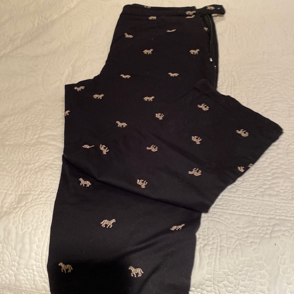 Are you a zebra fan?  Black pants with zebra design embroidered overall.